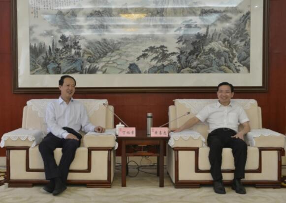 丁焰章拜會南昌市委副書記、市長黃喜忠